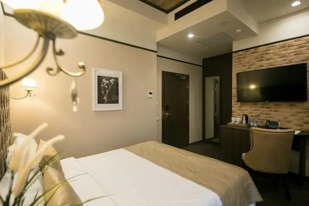 Deluxe Tek Büyük veya İki Ayrı Yataklı Oda