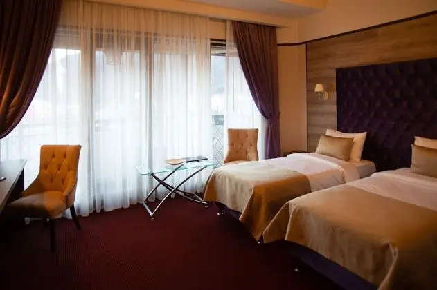 Deluxe Tek Büyük veya İki Ayrı Yataklı Oda