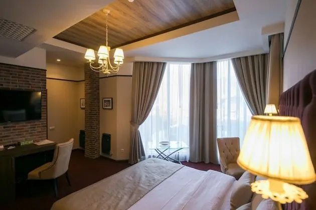 Deluxe Tek Büyük veya İki Ayrı Yataklı Oda