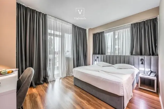 Deluxe Tek Büyük veya İki Ayrı Yataklı Oda