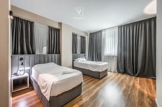Deluxe Tek Büyük veya İki Ayrı Yataklı Oda