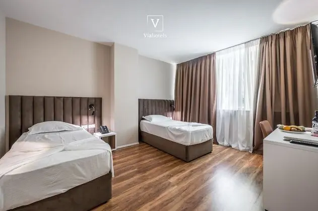 Deluxe Tek Büyük veya İki Ayrı Yataklı Oda