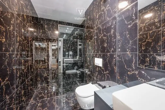 Deluxe Tek Büyük veya İki Ayrı Yataklı Oda