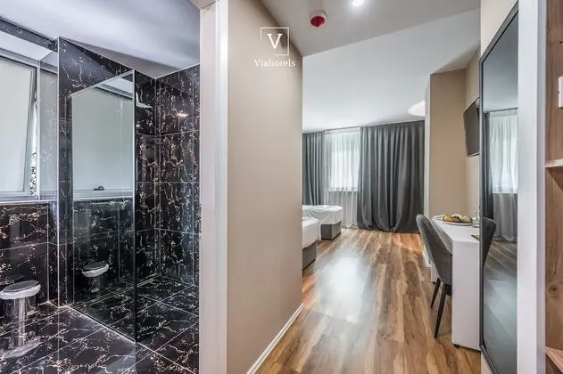 Deluxe Tek Büyük veya İki Ayrı Yataklı Oda