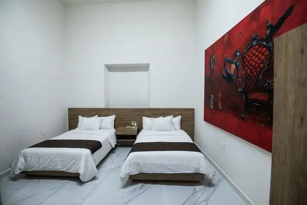 Habitación 2 camas matrimoniales