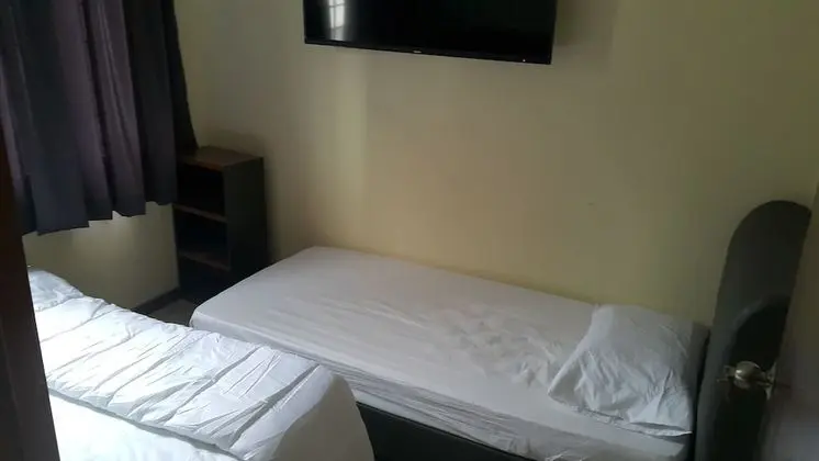 Üç Kişilik Oda