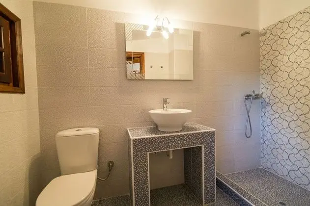 Tek Büyük veya İki Ayrı Yataklı Oda, Bahçe Manzaralı
