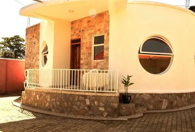 The rounded guest house and Safari