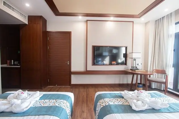Deluxe Tek Büyük veya İki Ayrı Yataklı Oda