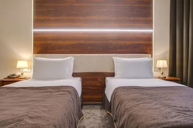 Deluxe Tek Büyük veya İki Ayrı Yataklı Oda