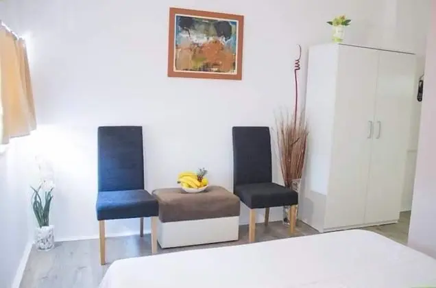 Üç Kişilik Oda, Bahçe Manzaralı