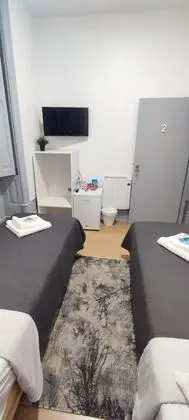 Economy İki Ayrı Yataklı Oda, 2 Tek Kişilik Yatak, Ortak Banyo, Bahçe Manzaralı