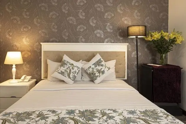 Deluxe Tek Büyük veya İki Ayrı Yataklı Oda