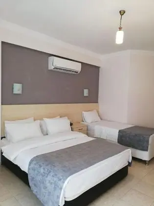 Üç Kişilik Oda