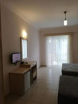 Üç Kişilik Oda