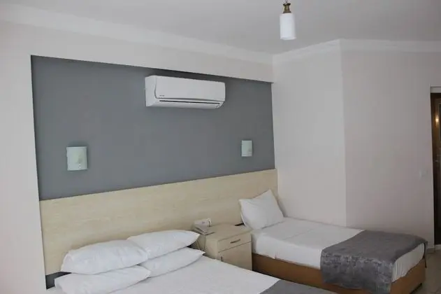 Üç Kişilik Oda