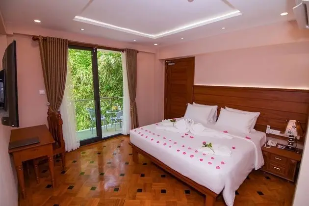 Deluxe Tek Büyük veya İki Ayrı Yataklı Oda
