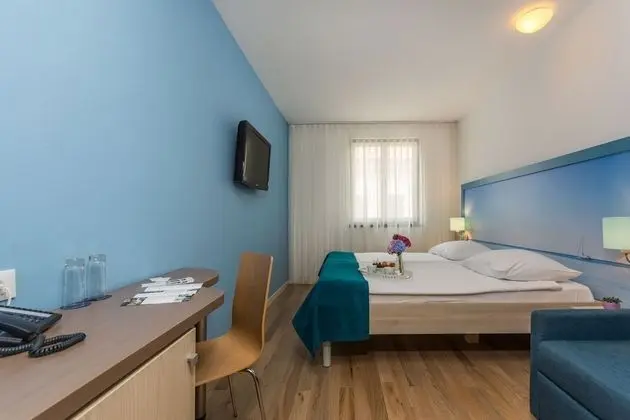 Economy Tek Büyük veya İki Ayrı Yataklı Oda