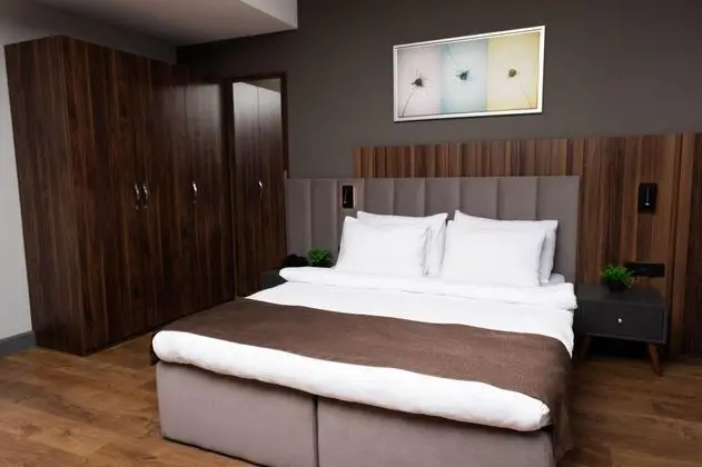 https://images.odamax.com/img/1024x768/odamax/image/upload/Vita_Suites_Karak_y_202601241140330_Yatak_Odas_1_.jpg