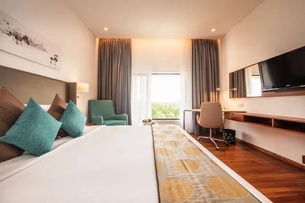 Deluxe King Room with One way Airport Transfer including 15% off on F&B & Spa
