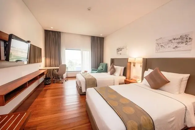 Deluxe Twin Room with One way Airport Transfer including 15% off on F&B & Spa