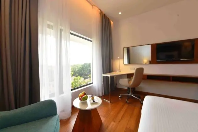 Deluxe Twin Room with One way Airport Transfer including 15% off on F&B & Spa