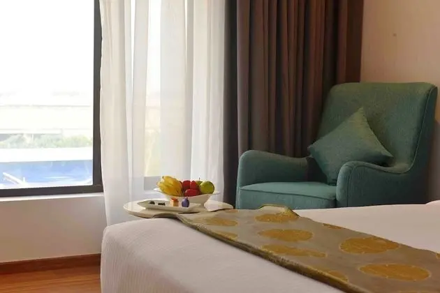 Deluxe Twin Room with One way Airport Transfer including 15% off on F&B & Spa