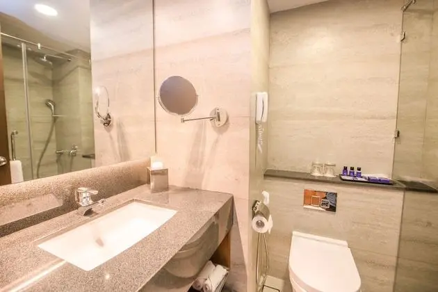 Deluxe King Room with One way Airport Transfer including 15% off on F&B & Spa