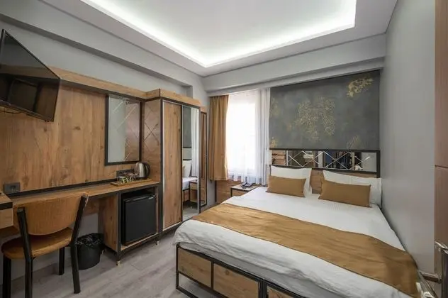 Deluxe Tek Büyük veya İki Ayrı Yataklı Oda, 1 Çift Kişilik veya 2 Tek Kişilik Yatak