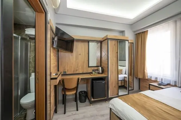 Deluxe Tek Büyük veya İki Ayrı Yataklı Oda, 1 Çift Kişilik veya 2 Tek Kişilik Yatak