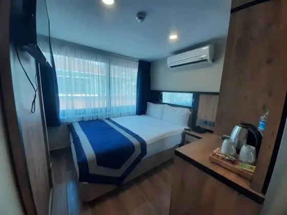 Deluxe Tek Büyük veya İki Ayrı Yataklı Oda, 1 Çift Kişilik veya 2 Tek Kişilik Yatak