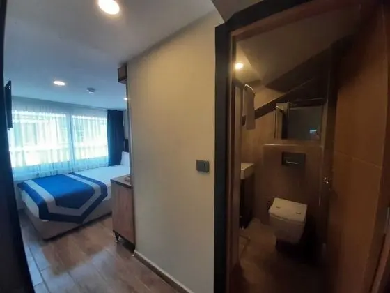 Deluxe Tek Büyük veya İki Ayrı Yataklı Oda, 1 Çift Kişilik veya 2 Tek Kişilik Yatak