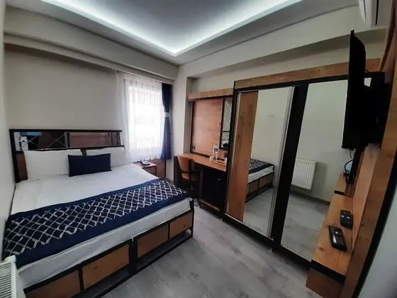 Deluxe Tek Büyük veya İki Ayrı Yataklı Oda, 1 Çift Kişilik veya 2 Tek Kişilik Yatak
