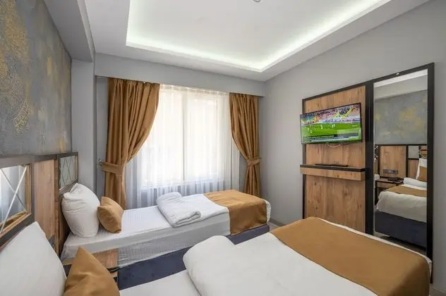 Deluxe Tek Büyük veya İki Ayrı Yataklı Oda, 1 Çift Kişilik veya 2 Tek Kişilik Yatak