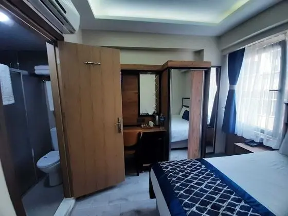 Deluxe Tek Büyük veya İki Ayrı Yataklı Oda, 1 Çift Kişilik veya 2 Tek Kişilik Yatak