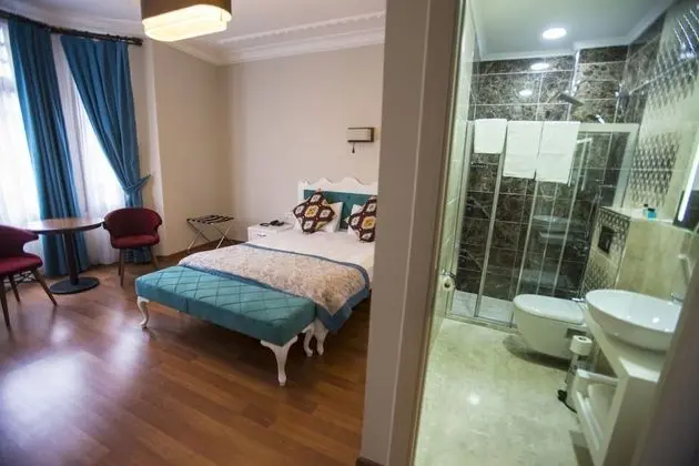 Deluxe Tek Büyük veya İki Ayrı Yataklı Oda