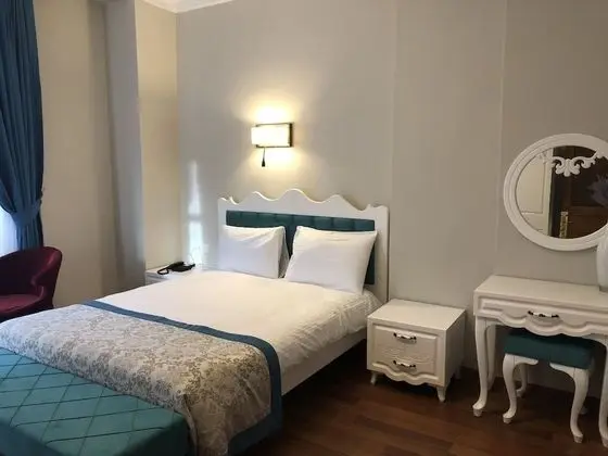 Deluxe Tek Büyük veya İki Ayrı Yataklı Oda