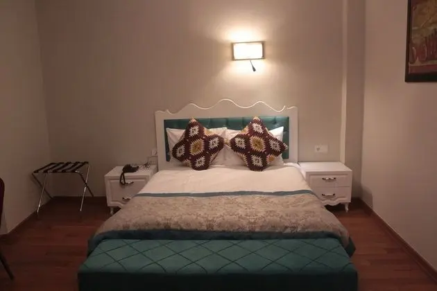 Deluxe Tek Büyük veya İki Ayrı Yataklı Oda