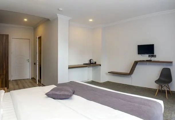 Deluxe Tek Büyük veya İki Ayrı Yataklı Oda