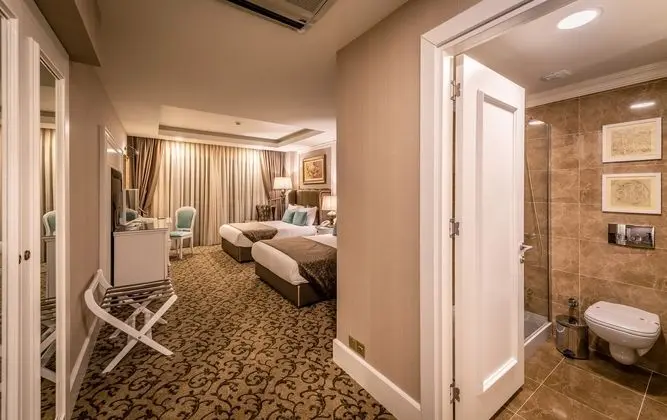 https://imagessl.etstur.com/files/images/hotelImages/CY/50233/l/Vuni-Palace-Hotel---Casino-Oda-270695.jpg