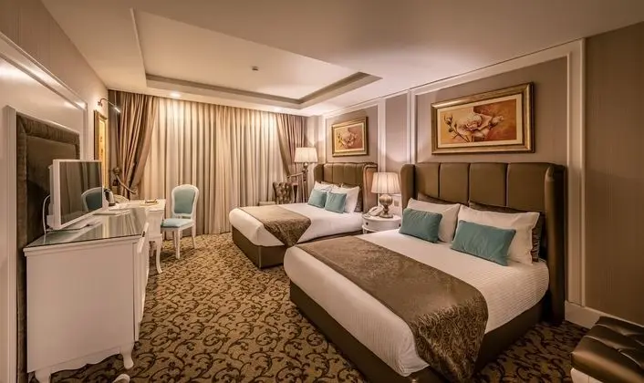 https://imagessl.etstur.com/files/images/hotelImages/CY/50233/l/Vuni-Palace-Hotel---Casino-Oda-270696.jpg