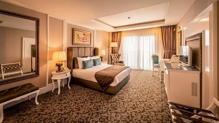 https://imagessl.etstur.com/files/images/hotelImages/CY/50233/l/Vuni-Palace-Hotel---Casino-Oda-270698.jpg