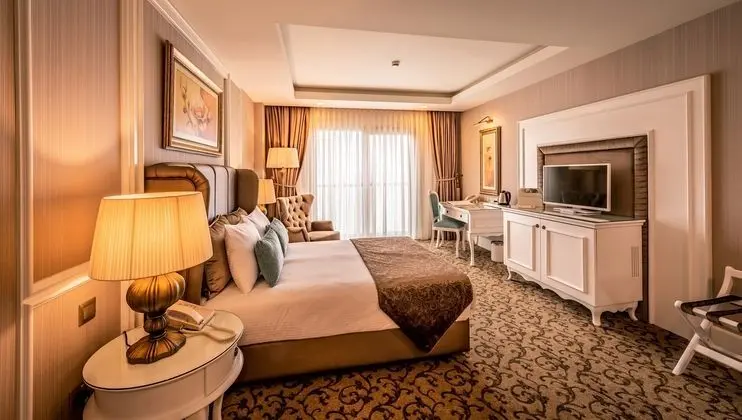 https://imagessl.etstur.com/files/images/hotelImages/CY/50233/l/Vuni-Palace-Hotel---Casino-Oda-270699.jpg