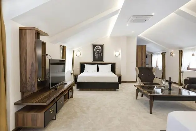 Deluxe Dört Kişilik Oda