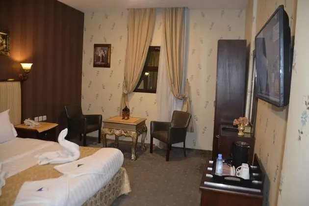 Economy Tek Büyük veya İki Ayrı Yataklı Oda
