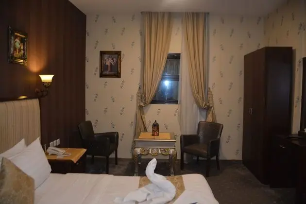 Economy Tek Büyük veya İki Ayrı Yataklı Oda