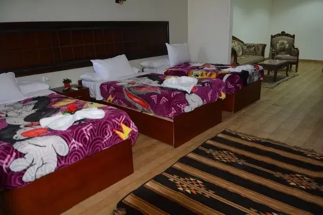 Deluxe Üç Kişilik Oda, Bahçe Manzaralı