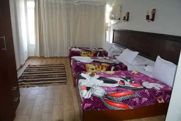 Deluxe Üç Kişilik Oda, Bahçe Manzaralı