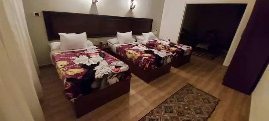 Deluxe Üç Kişilik Oda, Bahçe Manzaralı