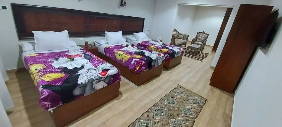 Deluxe Üç Kişilik Oda, Bahçe Manzaralı